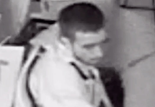 CCTV image is released after knife raid at shop robbery suspect
