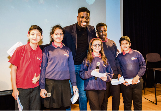 The Voice star Jermain backs fair deal for next generation Jermain Jackman with members of Duncombe Primary School Debating Society
