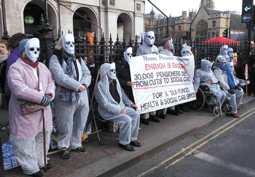 Masked Islington pensioners join NHS protest march Pensioners' NHS march