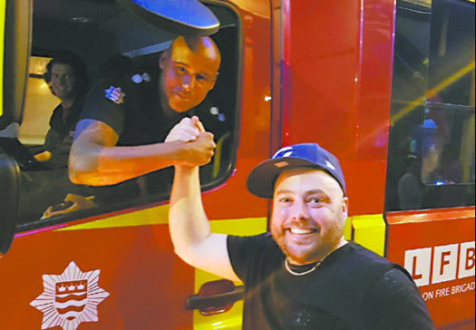 Pub’s thank-you gesture to the firefighters Our Neighbours_GoneBurger's Will Trippas with crew from Old Street Fire Station