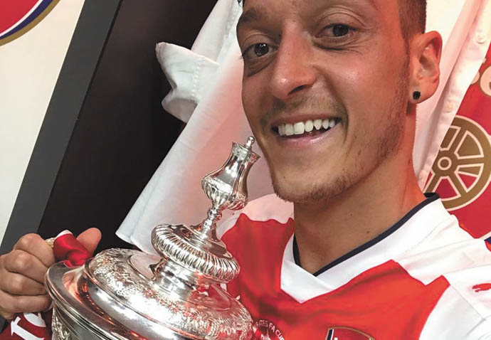 You signed Bale, we let Ozil go Ozil-Twitter