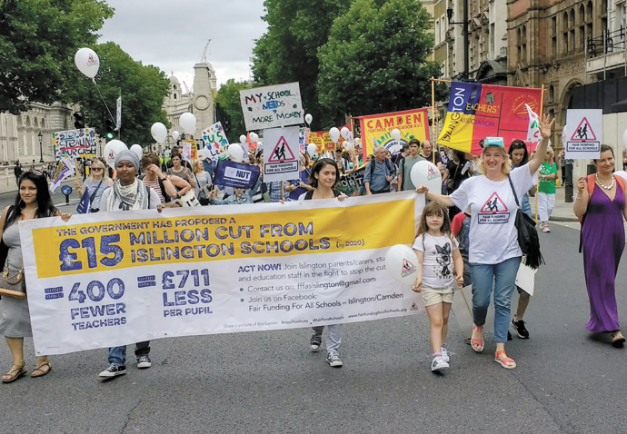 Parents march against cuts Anti-cuts march