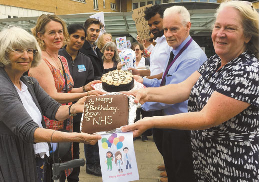 Islington Keep Our NHS Public members with their cakes for Whittington staff