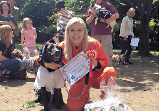 Crime pays for pooches at Barnsbury Square’s summer fete Naomi Jeffs and her labrador Laika