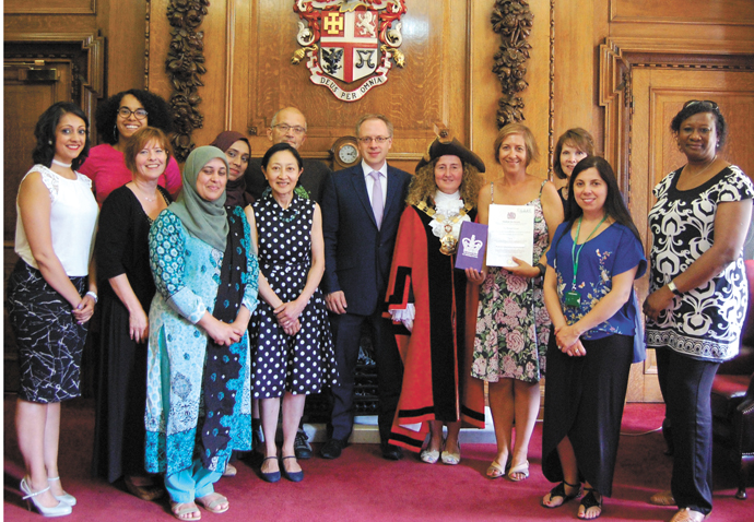 Volunteer group awarded honour from the Queen Parent House volunteers at Town Hall