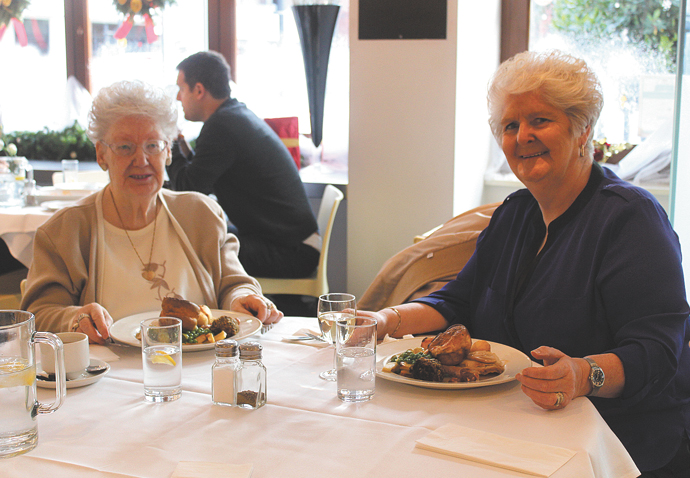 Elderly enjoy slap-up festive lunch Jean Holt and Jeannie Kirkwood