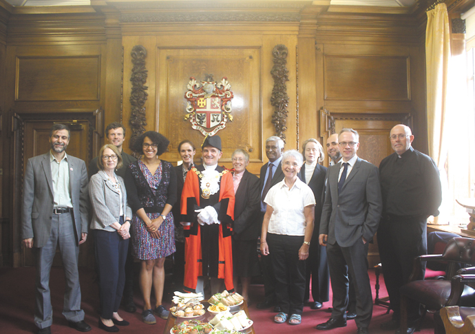 Faith leaders with mayor David Poyser