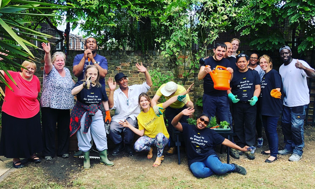 M&S volunteers give Centre 404 a garden revamp M&S volunteers with Centre 404 members in the transformed garden