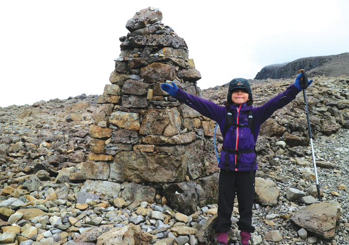 Charity champ Violet hits peak fundraising Violet Morgan at the summit plateau
