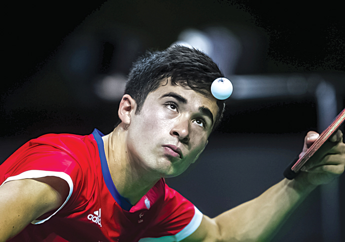 Kim Daybell serving - credit OnEdition for ParalympicsGB