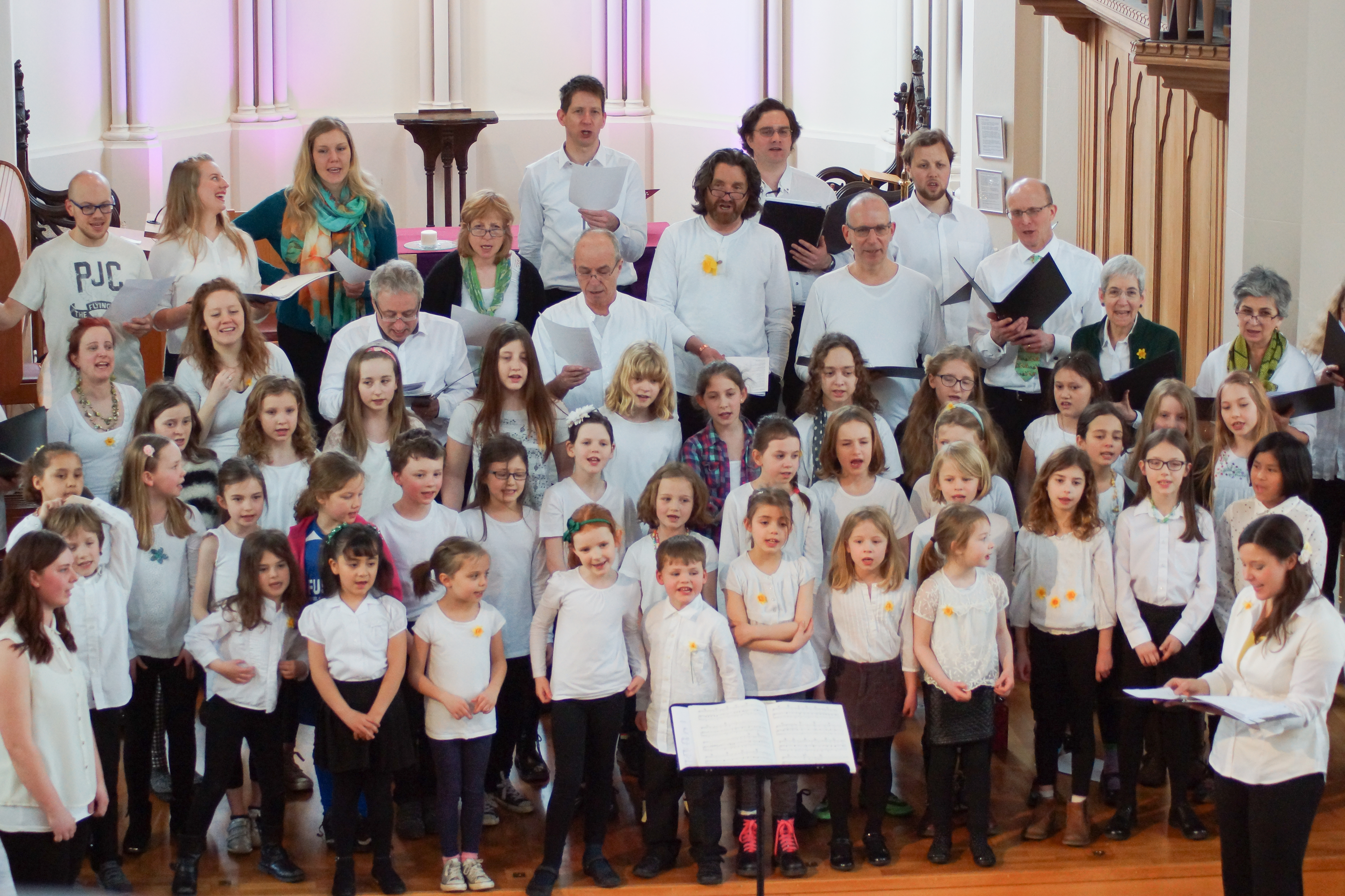 Eclectic Voices and Highbury Youth Choir rehearsing for their concert on Sunday