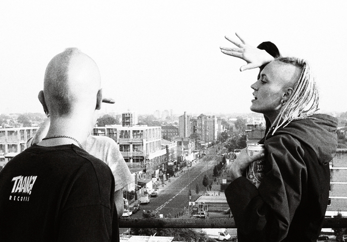 Ren and Liz overlooking Kingsland Road, Dalston, London, 2000
