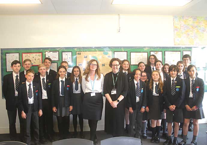‘Don’t mess up’ is challenge for Islington’s first female bishop Dr Joanne Woolway Grenfell with St Mary Magdelene Academy pupils and headteacher Victoria Linsley