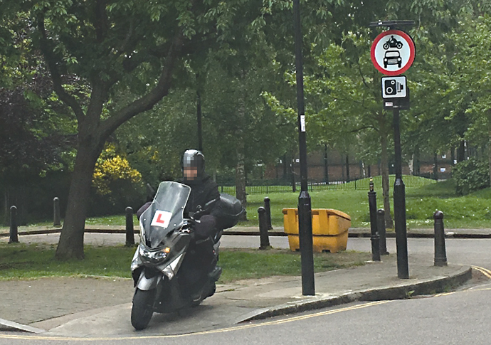Moped on pavement in Laycock Street