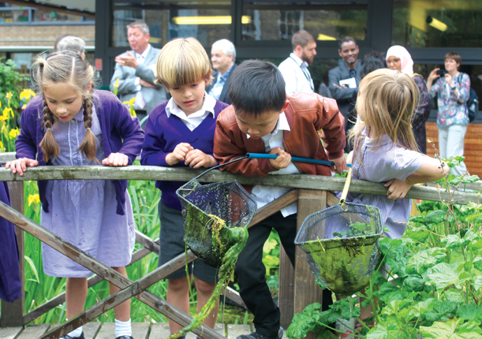 Country in the city: Nature waits inside Finsbury school gates Children fishing