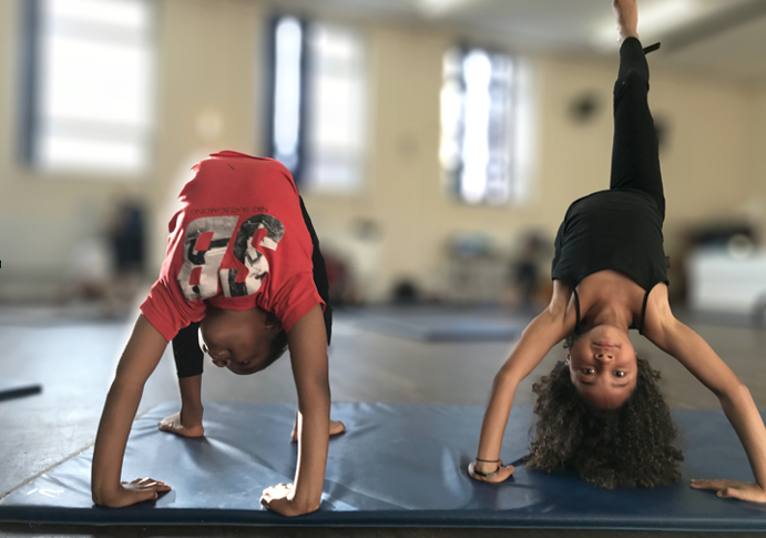 Kicking up a stink, knocking down a landmark: Fantastic Feats spells fun for kids in the City TRAPEZE CITY LONDON