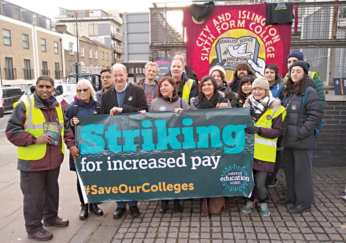 Staff at Angel college go on strike in pay row Teachers on strike outside City and Islington College