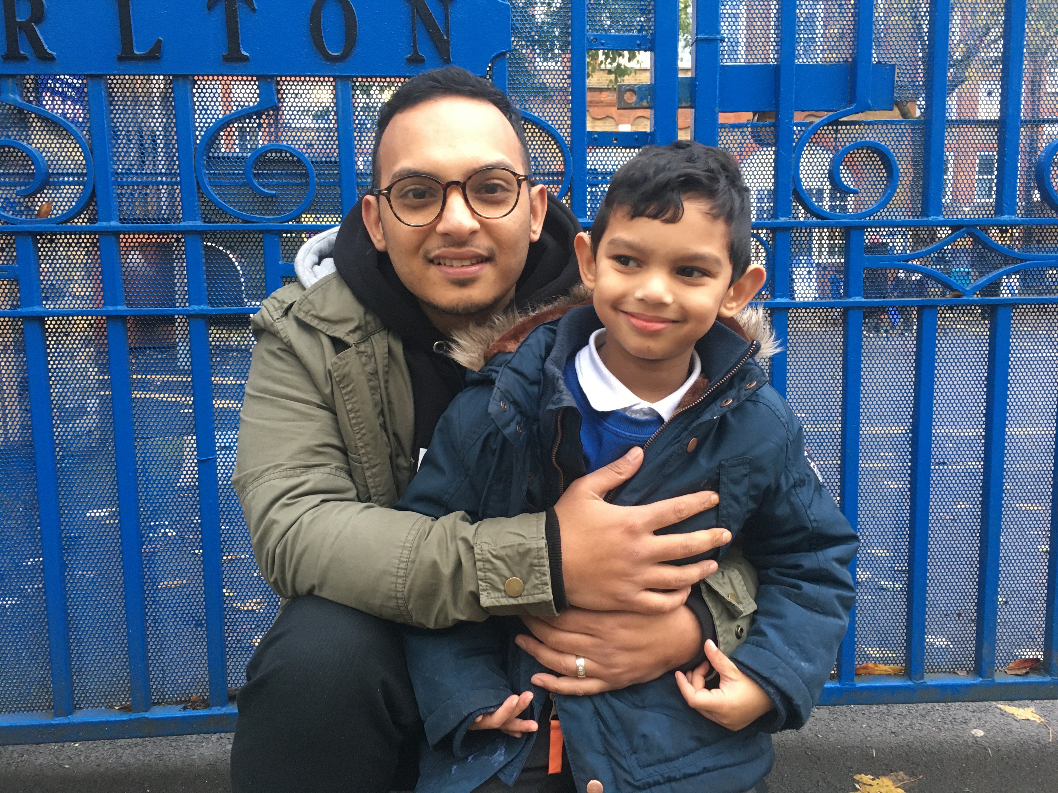 Former pupil Kash Faruque with his son