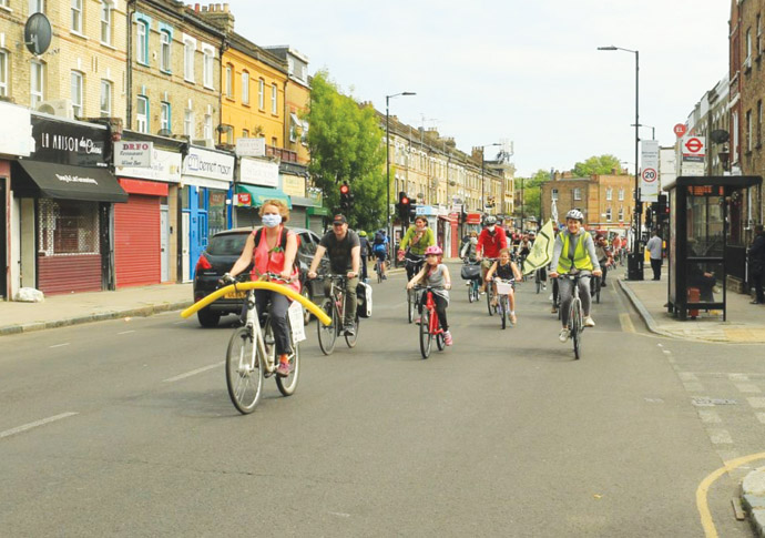 XR activists paint their own cycle lanes for lockdown rides XR activists in Blackstock Road