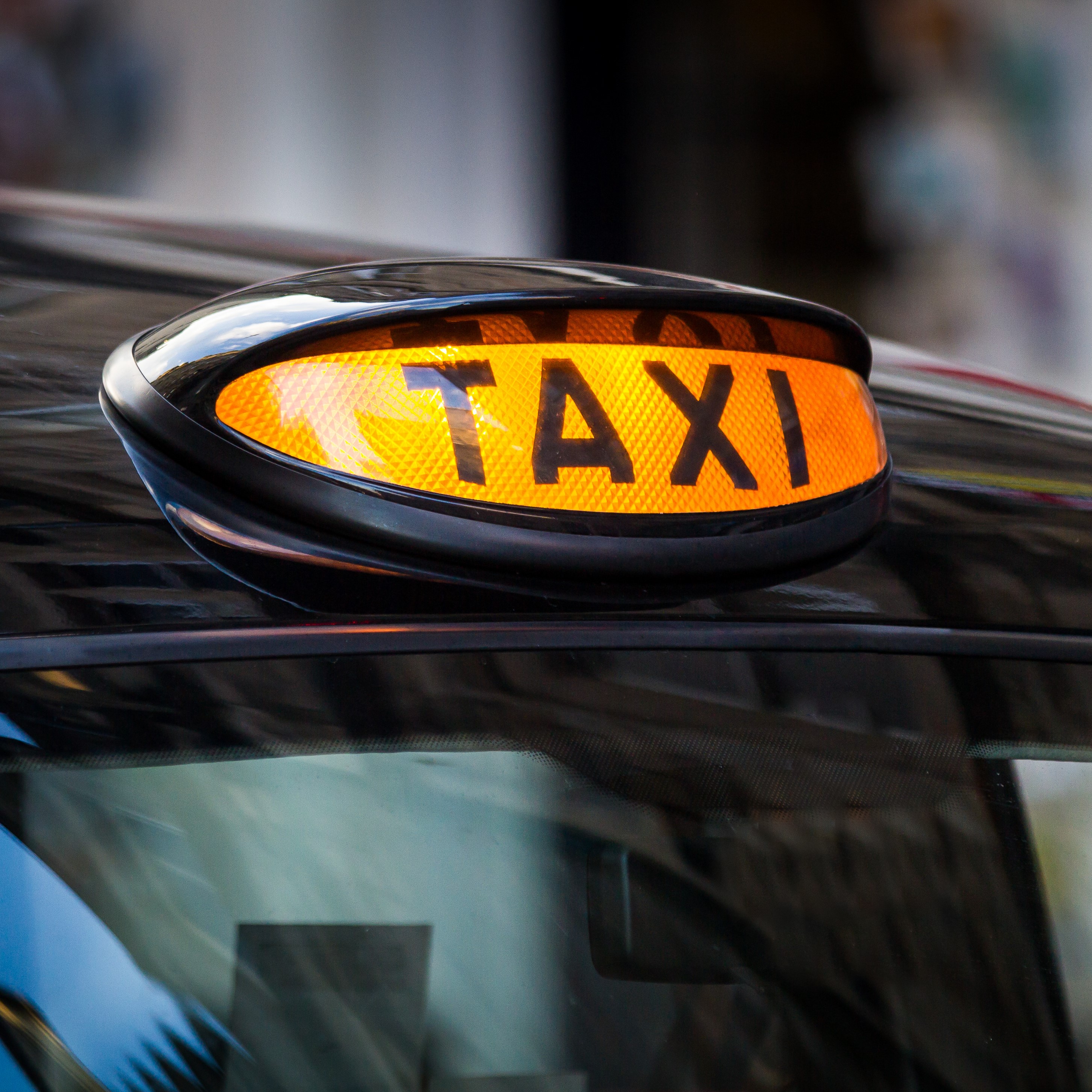 Taxis are used in an emergency Taxi sign in UK