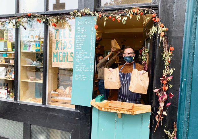 Big-hearted businesses: ‘We couldn’t watch kids go hungry’ Nick Blakeley and Maddison Willmott in Southpaw Coffee caffee