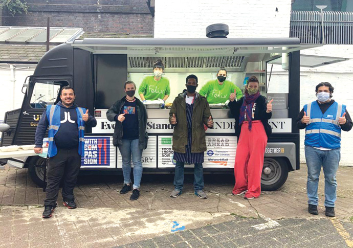 Hot ticket! Volunteers serve up free meals Muslim welfare centre Free meals