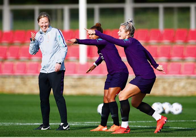 Spurs’ long-serving bosses are axed Rehanne Skinner shares a joke with England stars Nikita Parris and Rachel Daly. Credit is The FA. IMG_3929