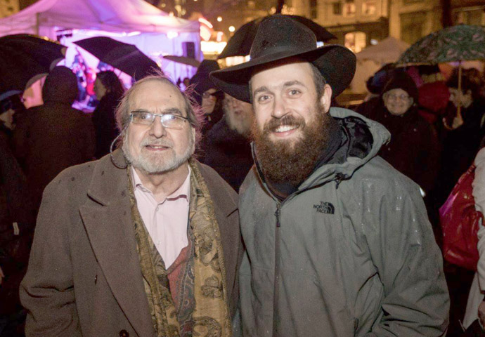 Mezuza on the front door? Rabbi Mendy Korer and Eric Gordon