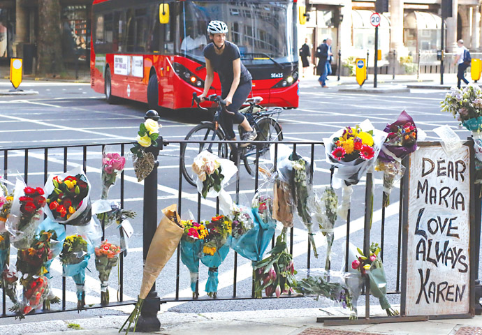 We need cycle lanes and safe junctions Dr Marta Krawiec_flowers at the scene