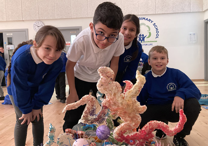 Ship shape! Art-loving pupils get creative Moreland Primary School Year four pupils with their artwork