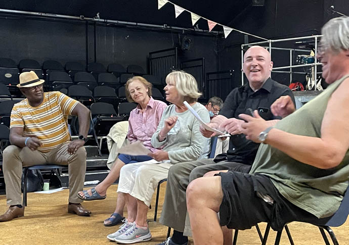 Theatre company seeks to empower women Small Acts of Resistance town hall laughing DR