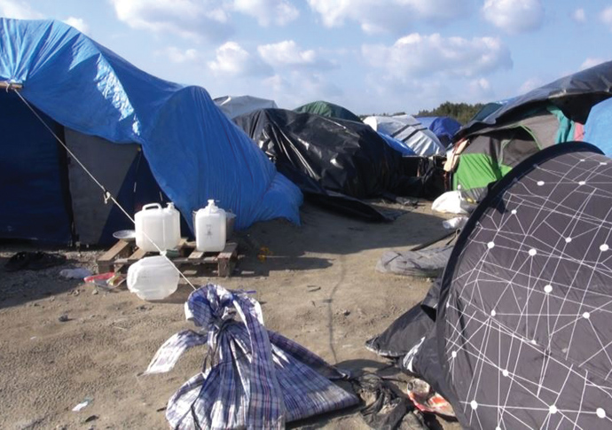 In-tents pressure Calais Jungle Photo credit_VOA_ Nicolas Pinault