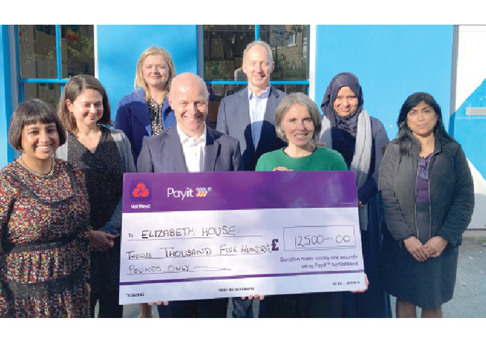 Bank signs big cheque for charity Elizabeth House