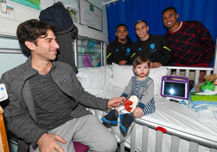 Smiles better! Spurs and Arsenal stars visit children at the Whittington Arsenal at Whittington