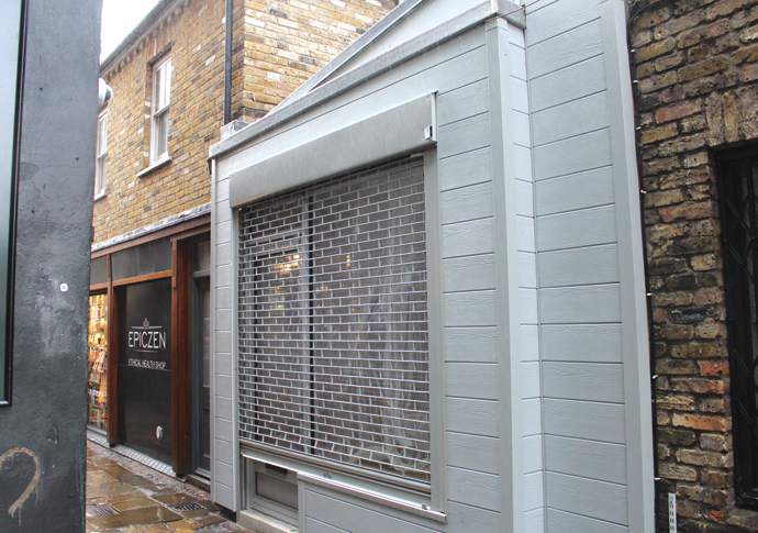A real pane: fake wood shop front ‘ruins character’ New shop front