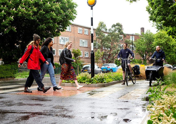 People walk and cycle on Benwell Road