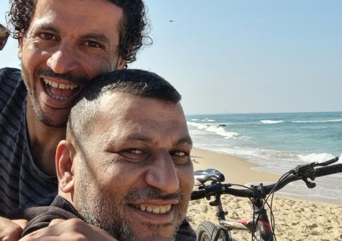 Bring our Gazan relatives to the UK Ahmed Masoud with his brother Khaled in Gaza last summer. Khaled was killed in January. jpg