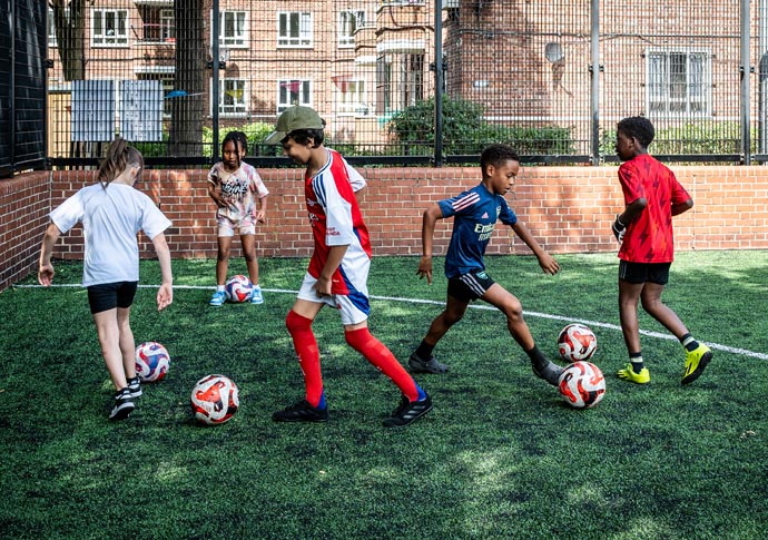 Back on the ball! Community footie pitch reopens after an upgrade Mayville kids playing mayville
