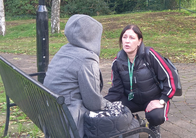 Cheryl Vaughan talks to homeless person copy new