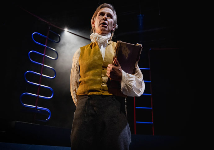 Review: Pins and Needles, at Kiln Theatre Richard Cant (Edward Jenner) - credit Mark Senior