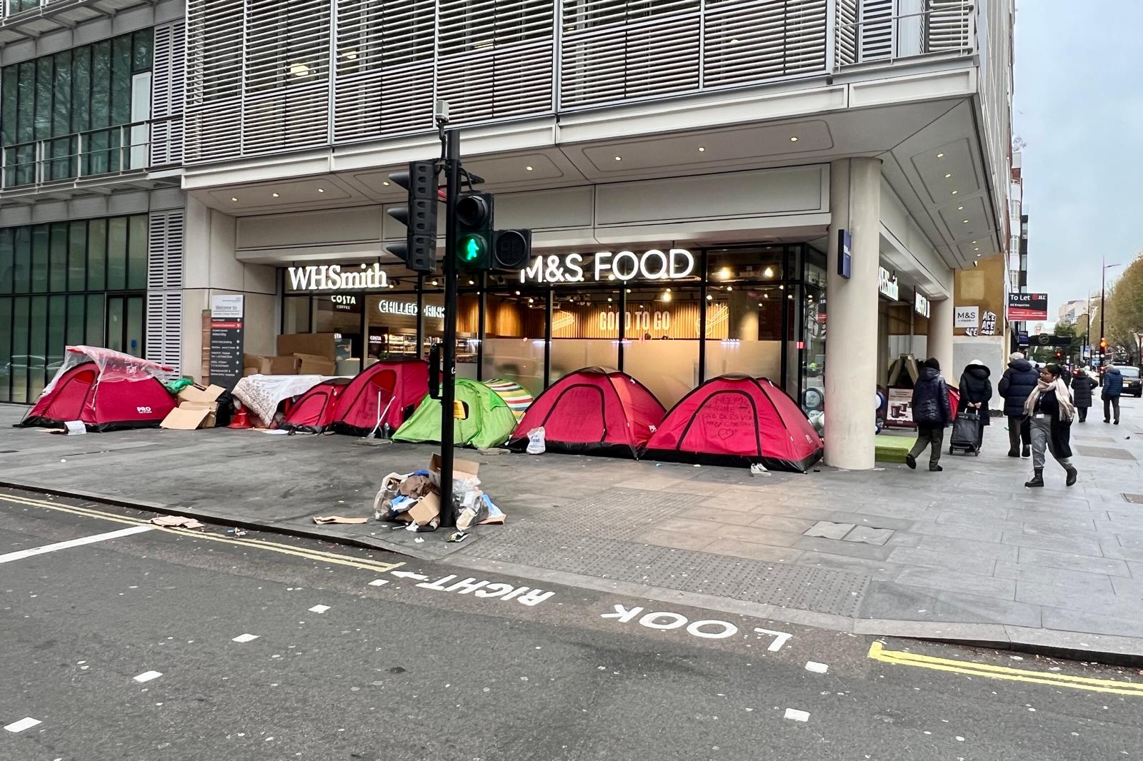 Join us for a day of talks on ending homelessness in north London Homeless tents outside Marks and Spencers on Tottenham Court Road