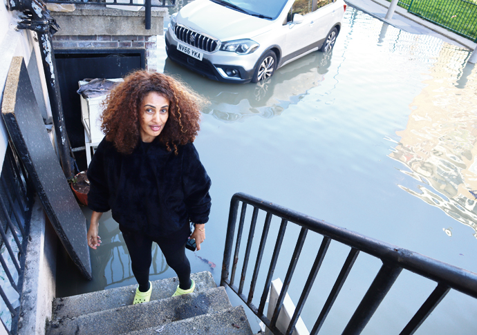 Burst main destroys businesses in five minutes Flood_RAHEL TEKESTE - owns Delina Hair & Beauty Salon