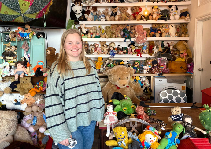 Ted over heels in love with old toys Jess Garfield-Doyle with some of the second-hand soft toys at The Toy Project’s new Rehoming Centre in Junction Road