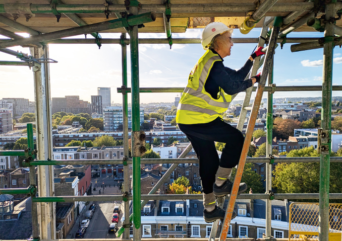 Good heavens! Vicar scales 40-metre spire for blessing Caroline climbs exposed ladder on spire.jfif
